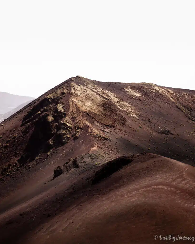 photography of a volcano in Timanfaya